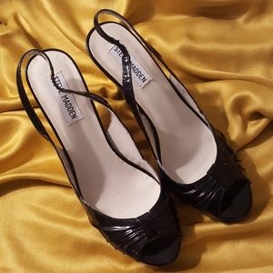 Seldom worn black patent slingback peep toe heels